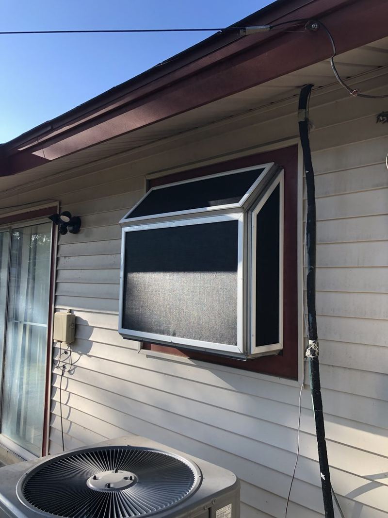 Angled bay window solar screen detail