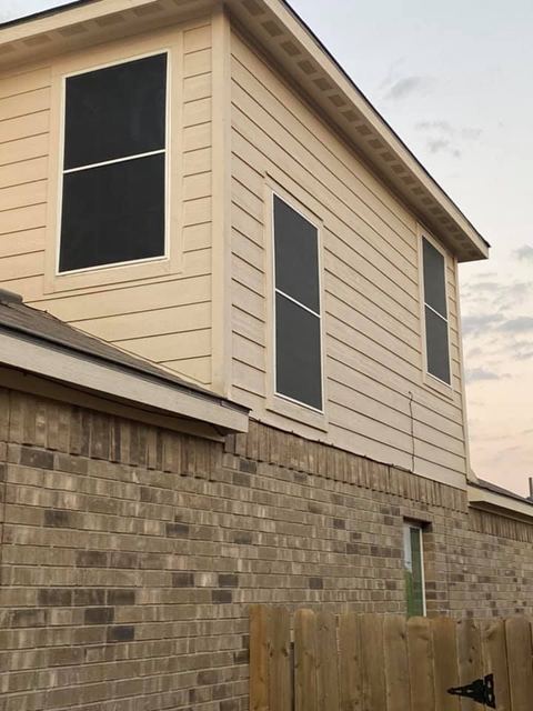 Brick home solar screens