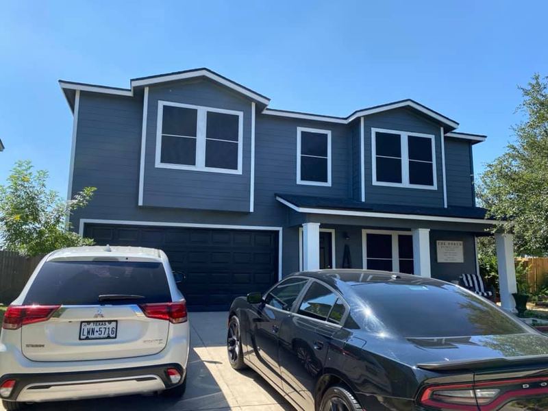 Two-story home with solar screens fitted to all windows