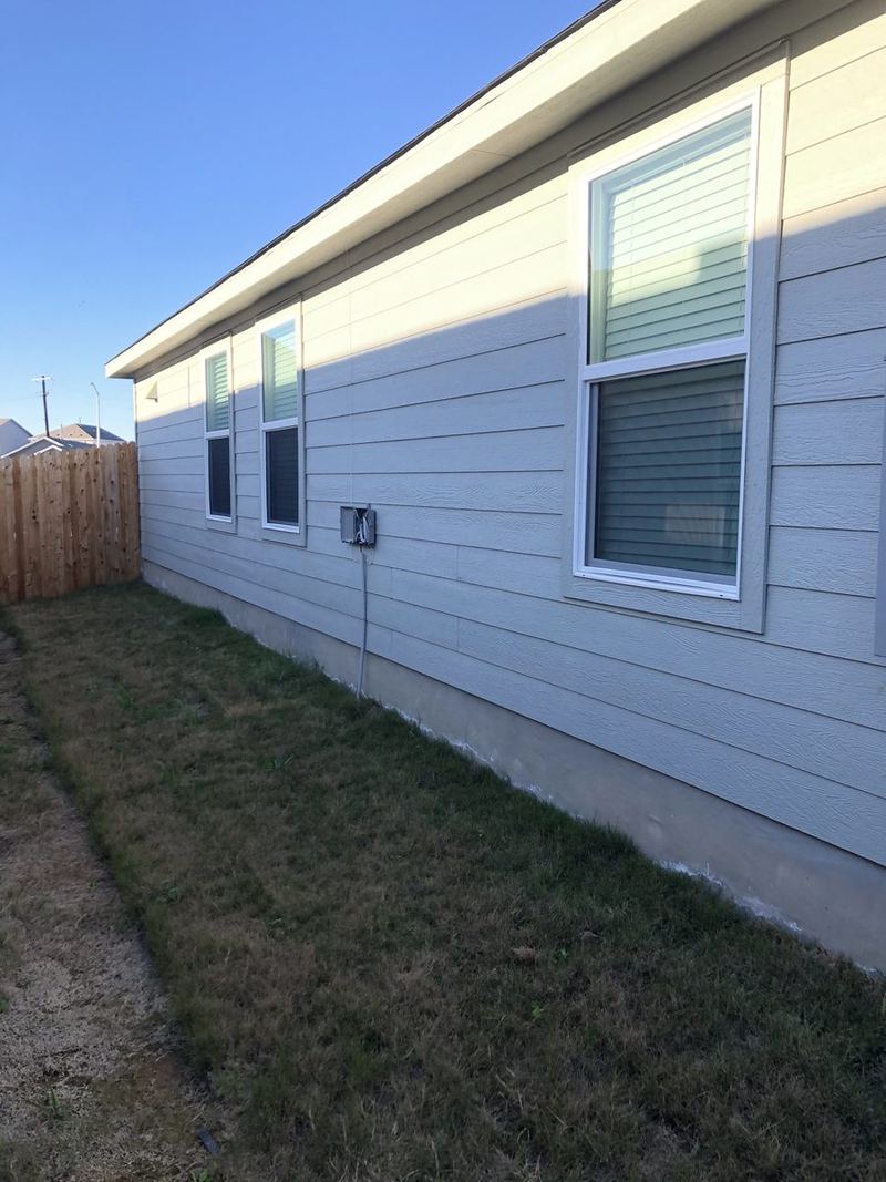 Mosquito screens along side of home